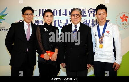 (From left) Kenneth Fok Kai-kong, eldest son of Timothy Fok Tsun-Ting, Chinese Olympic diving champion Guo Jingjing, Kenneth Fok Kai-kong's wife, Timo Stock Photo