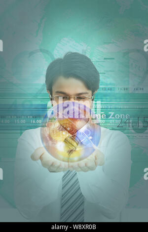 Businessman with a globe of circuits Stock Photo