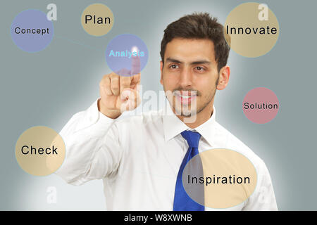 Businessman using touch screen Stock Photo