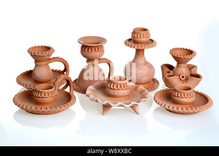Decorative ceramic products on white background. Stock Photo