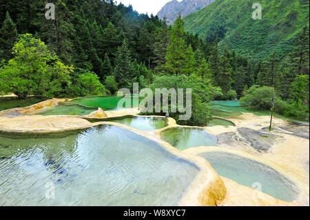 Landscape of a pond at Huanglong Scenic and Historic Interest Area in Songpan County, Aba Tibetan & Qiang Autonomous Prefecture, southwest Chinas Sich Stock Photo