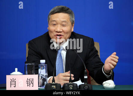 Xiao Gang, Chairman of the China Securities Regulatory Commission (CSRC), speaks during a press conference for the Second Session of the 12th NPC (Nat Stock Photo