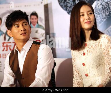 Taiwanese singer and actor Nicky Wu, left, and his actress girlfriend Liu Shishi attend a press conference for their new TV series, Incisive Great Tea Stock Photo