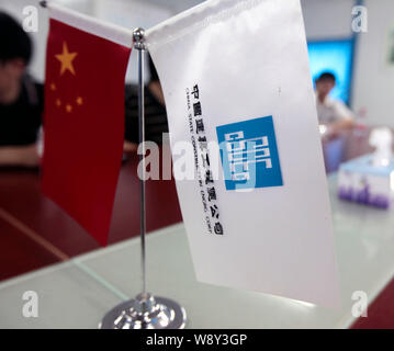 --FILE--People visit the stand of CSCEC (China State Construction Engineering Corporation) during an exhibition in Beijing, China, 6 July 2011.   Chin Stock Photo