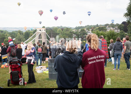 Clifton Down, Bristol, UK. 8th August 2019.  This year's Bristol Balloon Fiesta begins with a spectacular early morning mass ascent from the Ashton Co Stock Photo