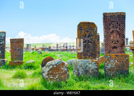 Stone carved old stones traditional khachkars, Noratus cemetery in Armenia Stock Photo