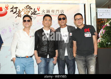 (From left) Hong Kong actors Nick Cheung, Tony Leung Chiu-wai, Tony Leung Ka-fai and singer Jacky Cheung pose during the opening event for the hotpot Stock Photo
