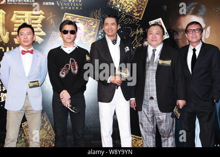 (From left) Hong Kong actor Chapman To, Nicholas Tse, Chow Yun-fat, director Wong Jing pose at a premiere for their new movie, From Vegas to Macau, al Stock Photo