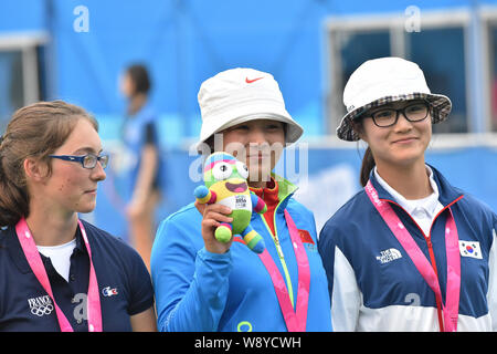 (From left) Silver medalist Melanie Gaubil of France, gold medalist Li ...