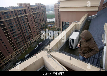 The Two High Rise Apartment Buildings Collide With Each Other On The Roof At The Xinyuan West Community In Chuansha Town Pudong Shanghai China 24 Stock Photo Alamy