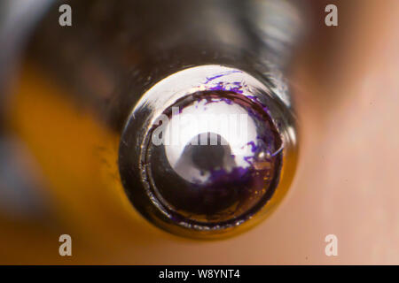 Macro photo of a  used ballpoint pen tip Stock Photo