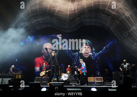 The members of English rock band The Rolling Stones perform at the concert of their world tour, 14 On Fire, in Shanghai, China, 12 March 2014. Stock Photo