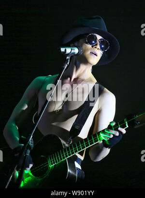 Japanese singer Jin Akanishi performs during his concert in