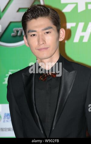 Chinese actor and singer Zhang Han or Hans Zhang arrives at an airport