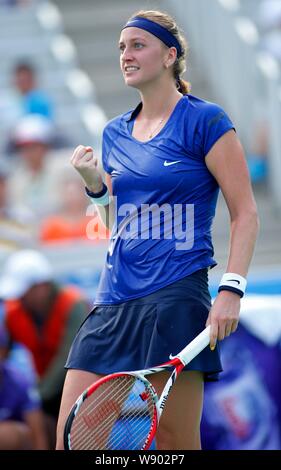 Petra Kvitova of the Czech Republic reacts after scoring against Elina Svitolina of Ukraine during the women's singles semi-finals of the 2014 WTA Wuh Stock Photo