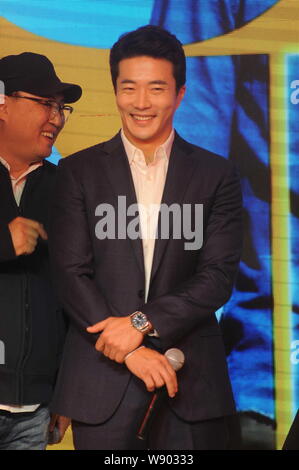 South Korean actor Kwon Sang-woo smiles during a press conference to mark the completion of the filming of his new movie 'Honey Enemy' in Shanghai, Ch Stock Photo