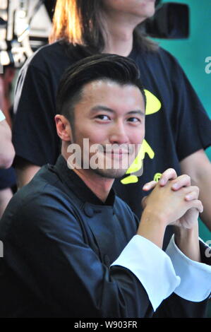 Hong Kong singer and actor Nicholas Tse attends a promotional event for Olivoila olive oil in Hangzhou city, east Chinas Zhejiang province, 24 August Stock Photo