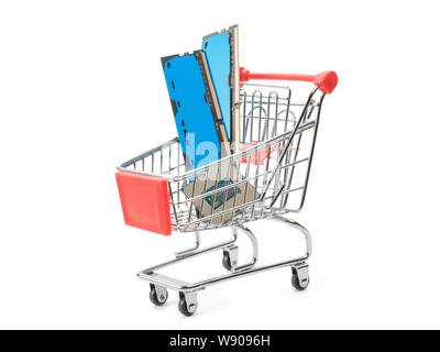 Toy shopping cart with computer parts. Isolated on white Stock Photo