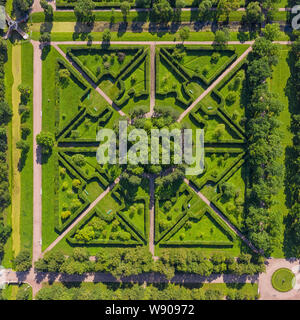 Square fragment of green formal garden aerial top view at sunny day. Stock Photo