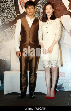 Taiwanese singer and actor Nicky Wu, left, and his actress girlfriend Liu Shishi pose during a press conference for their new TV series, Incisive Grea Stock Photo