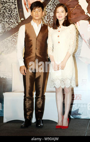 Taiwanese singer and actor Nicky Wu, left, and his actress girlfriend Liu Shishi pose during a press conference for their new TV series, Incisive Grea Stock Photo