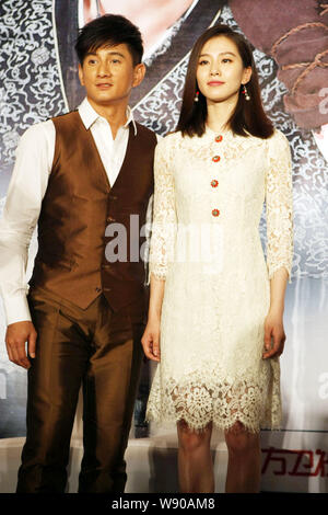 Taiwanese singer and actor Nicky Wu, left, and his actress girlfriend Liu Shishi pose during a press conference for their new TV series, Incisive Grea Stock Photo