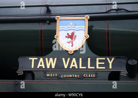 Name plate on preserved steam locomotive 34027 Taw Valley, a Southern Region West Country Class 4-6-2 pacific on Severn Valley Heritage Railway. Stock Photo