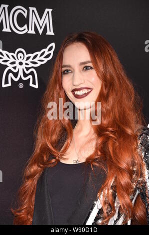 American model and actress Elizabeth Jagger, daughter of Mick Jagger and Jerry Hall, poses as she arrives at MCM 2015 Spring/Summer fashion show in Be Stock Photo