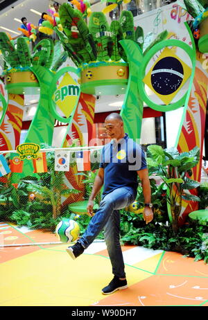 Dutch football star and manager Ruud Gullit, head coach of FC Terek Grozny, shows his football skills during a fans meeting for the upcoming 2014 FIFA Stock Photo