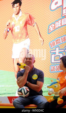 Dutch football star and manager Ruud Gullit, left, head coach of FC Terek Grozny, reacts during a fans meeting for the upcoming 2014 FIFA World Cup in Stock Photo