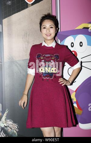 Hong Kong actress Miriam Yeung poses at a charity event of Hong Kong Girl Guides Association in Hong Kong, China, 18 September 2014. Stock Photo