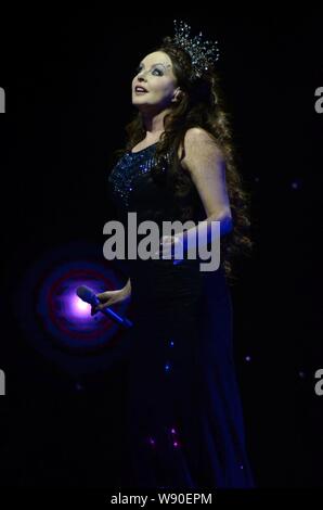 English classical soprano Sarah Brightman poses during a concert in Shanghai, China, 21 January 2014. Stock Photo