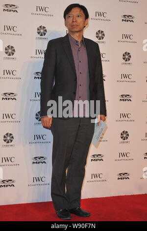 Charles Zhang Chaoyang, CEO of Sohu.com Inc., poses as he arrives at the Movie Night by IWC watches in Beijing, China, 20 April 2014. Stock Photo