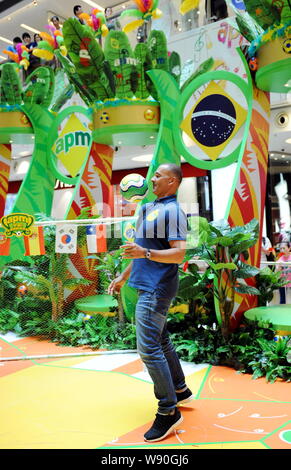 Dutch football star and manager Ruud Gullit, head coach of FC Terek Grozny, shows his football skills during a fans meeting for the upcoming 2014 FIFA Stock Photo