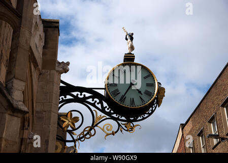 Church Clock (Little Admiral clock) of St Martin le Grand (St Martins) overhanging Coney Street, York , Yorkshire United Kingdom Stock Photo