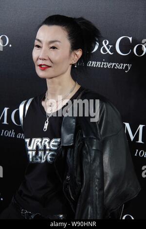 Hong Kong actress Maggie Cheung poses at a fashion event for the 10th anniversary of MO&Co. in Guangzhou city, south Chinas Guangdong province, 18 Jul Stock Photo