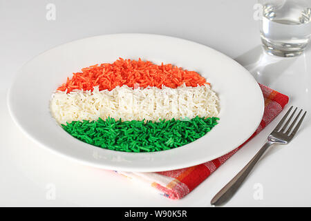 Rice served in a plate and representing Indian Flag Stock Photo