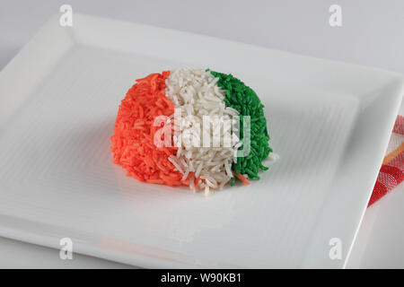 Rice served in a tray and representing Indian Flag Stock Photo