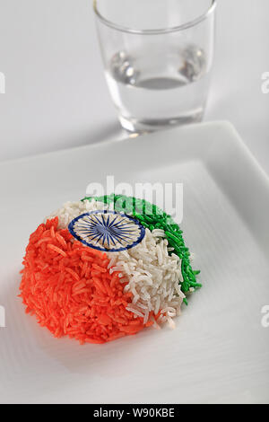 Rice served in a tray and representing Indian Flag Stock Photo