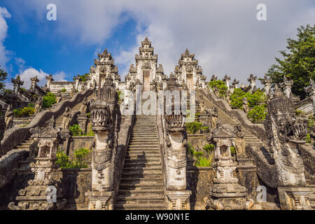 Three stone ladders in beautiful Pura Lempuyang Luhur temple. Summer landscape with stairs to temple. Paduraksa portals marking entrance to middle Stock Photo