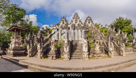 Three stone ladders in beautiful Pura Lempuyang Luhur temple. Summer landscape with stairs to temple. Paduraksa portals marking entrance to middle Stock Photo