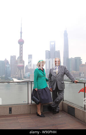 Queen Margrethe II, left, and her husband Prince Consort Henrik of Denmark pose during a press conference on the terrace of The Peninsula Shanghai Hot Stock Photo