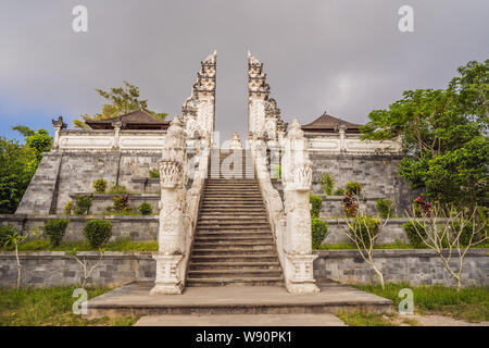 Three stone ladders in beautiful Pura Lempuyang Luhur temple. Summer landscape with stairs to temple. Paduraksa portals marking entrance to middle Stock Photo