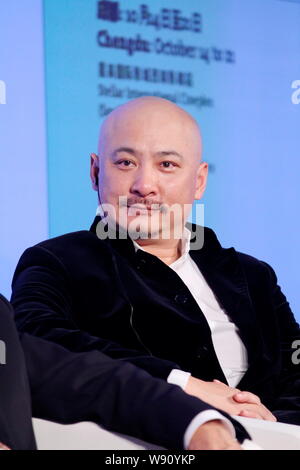 --FILE--Chinese director Wang Quan'an attends the opening ceremony for the Festival of German Cinema in Beijing, China, 12 October 2013.   Chinese fil Stock Photo