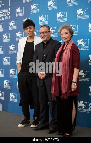 from left chinese actor qin hao director wang xiaoshuai and actress lv zhong pose at the photocall for their movie red amnesia during the 71st ve