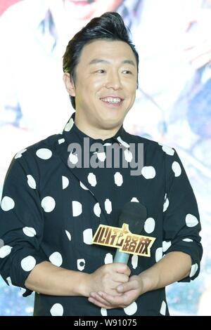 Chinese actor Huang Bo poses at a press conference of his new movie 'Xin Hua Lu Fang' in Shanghai, China, 26 August 2014. Stock Photo