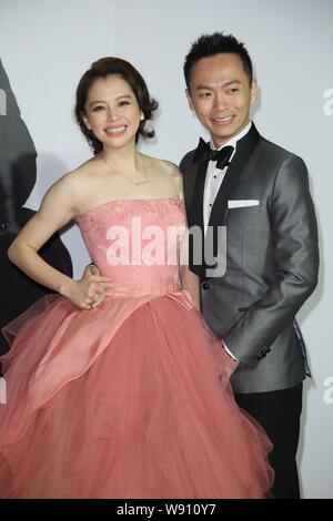 Taiwanese actress Vivian Hsu, left, and her husband Sean Lee pose