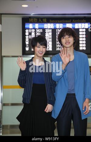 Japanese actress Ayame Goriki left and actor Kento Yamazaki wave