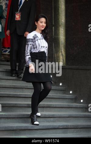 Chinese actress Liu Yifei arrives at the 8th anniversary celebration for China Gold's flagship store in Beijing, China, 18 November 2014. Stock Photo