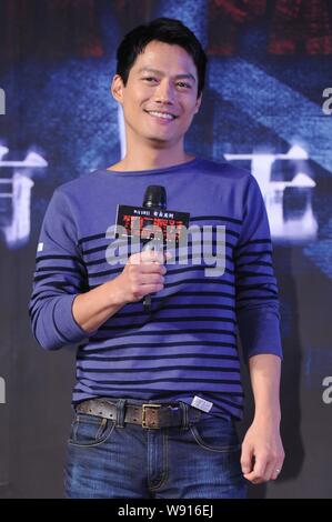 American actor Archie Kao, the husband of Chinese actress Zhou Xun, smiles during a press conference for his new movie, The Deathday Party, in Beijing Stock Photo